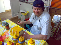 We also  make and paint other items such as, in this photo, bird boxes to put up around the grounds.